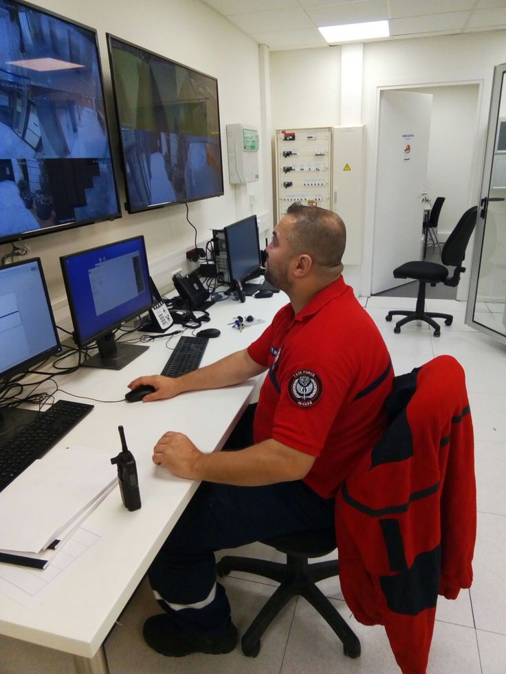 Security guard monitoring a store